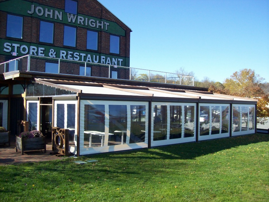 john wright store and restaurant with pergola closed and roll down screens pulled down